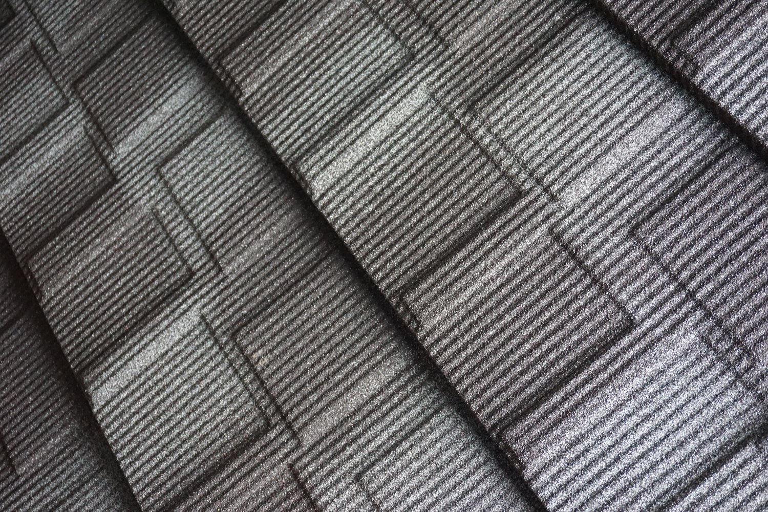 Stone coated metal roofing tile manufacture